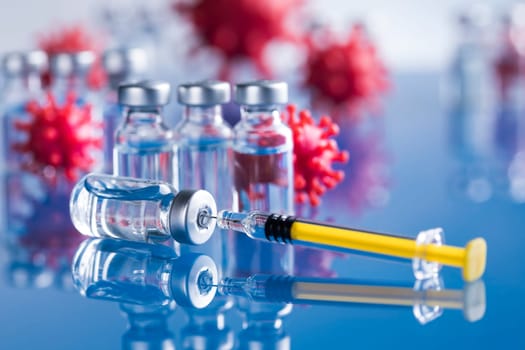 Close up medical syringe with a vaccine