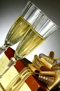 holiday card golden champagne and gift