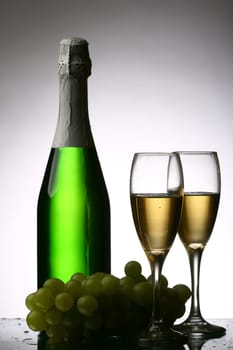champagne grape and green bottle
