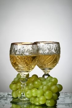 champagne grape and green bottle