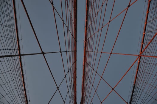 Low angle shot of rope scaffold of the Brooklyn bridge in New York
