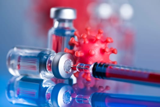 Close up medical syringe with a vaccine