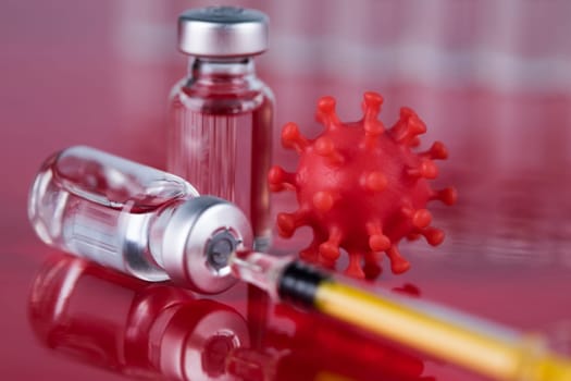 Close up medical syringe with a vaccine