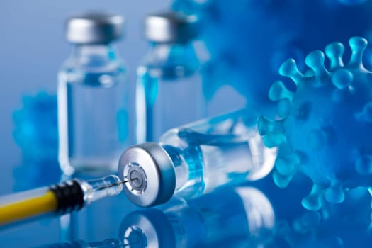 Close up medical syringe with a vaccine