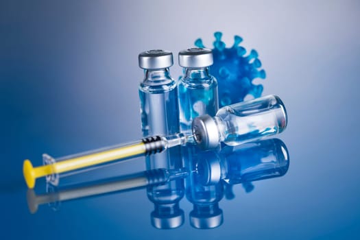 Close up medical syringe with a vaccine