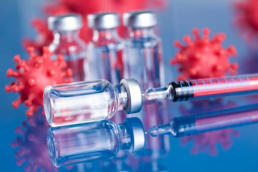 Close up medical syringe with a vaccine