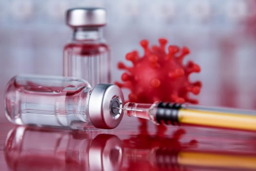 Close up medical syringe with a vaccine