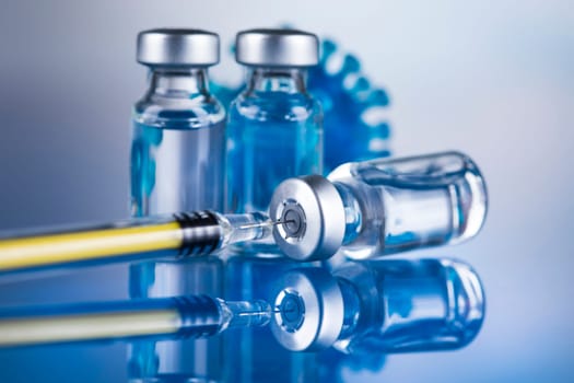 Close up medical syringe with a vaccine