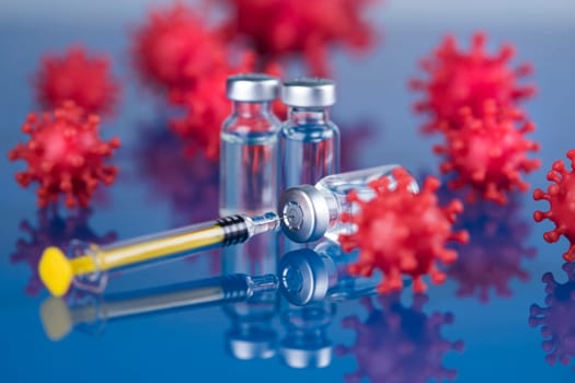 Close up medical syringe with a vaccine