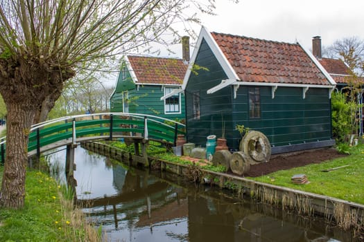 Traditional Houses in the Historic Village of Zaanse Schans on the Zaan River in the Netherlands