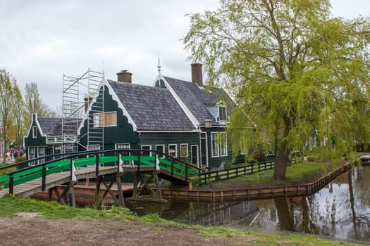 Traditional Houses in the Historic Village of Zaanse Schans on the Zaan River in the Netherlands