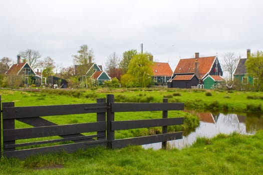 Traditional Houses in the Historic Village of Zaanse Schans on the Zaan River in the Netherlands