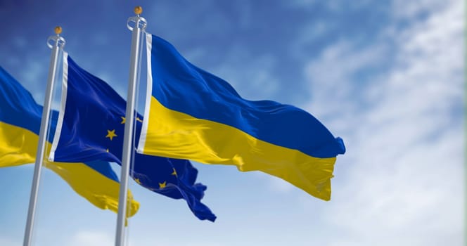 flags of Ukraine waving with European Union flag on a clear day. Democracy and politics.Rippled textile, 3d illustration render. Selective focus