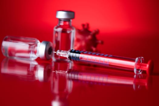 Close up medical syringe with a vaccine