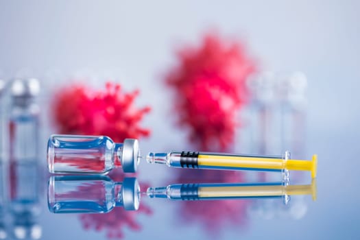 Close up medical syringe with a vaccine