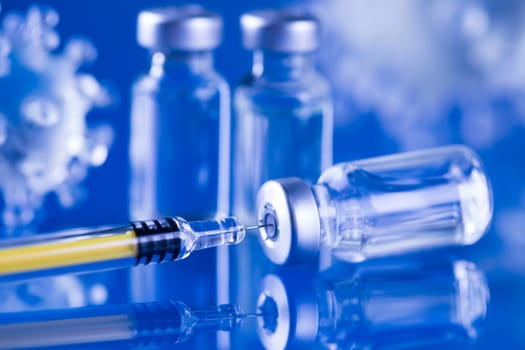 Close up medical syringe with a vaccine