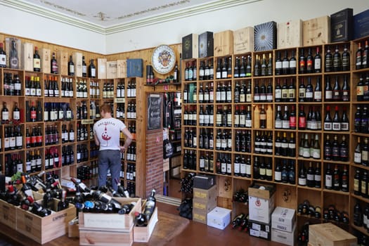 Montalcino, Italy - September 12, 2022: Interior of a wine shop in Montalcino ,Tuscany, Italy. Montalcino is famous for its Brunello di Montalcino wine.
