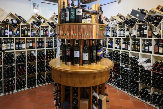 Montalcino, Italy - September 12, 2022: Interior of a wine shop in Montalcino ,Tuscany, Italy. Montalcino is famous for its Brunello di Montalcino wine.