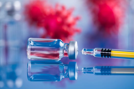 Close up medical syringe with a vaccine