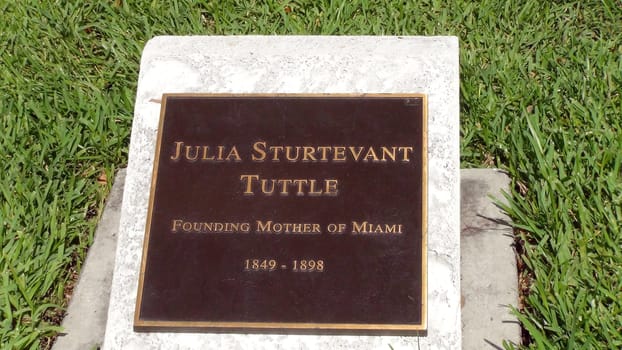 MIAMI, Florida - Mar 04, 2017: Memorial plaque on the statue of Julia Tuttle in Bayfront Park , an American businesswoman who owned the land on which Miami, Florida, was built.