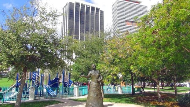 MIAMI, Florida - Mar 04, 2017: Bronze statue of Julia Tuttle in Bayfront Park , an American businesswoman who owned the land on which Miami, Florida was built.