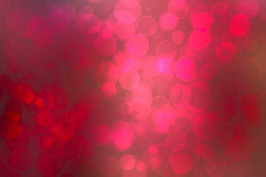 Abstract festive blurred red pink magenta background with light pink bokeh for wedding card or Valentine day.  Romantic textured backdrop with space for your design. Card concept.