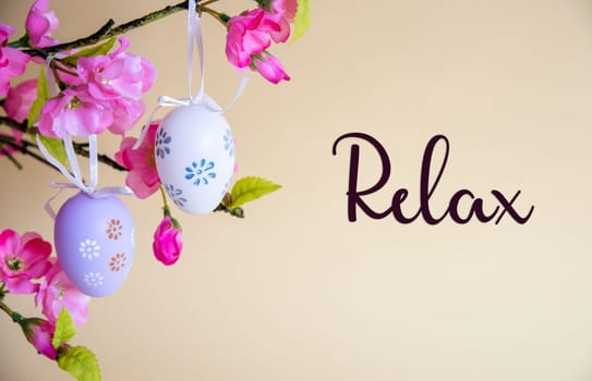 Beautiful Easter Egg Decoration With Spring Flowers. English Text Relax. Seasonal Easter Holiday Greeting Card.