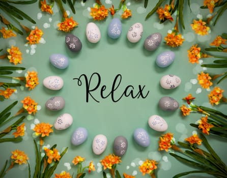 Flat Lay With English Text Relax. Easter Egg Decoration With Orange Spring Flowers. Light Green Paper Background With Bright And Shiny Light Effect.