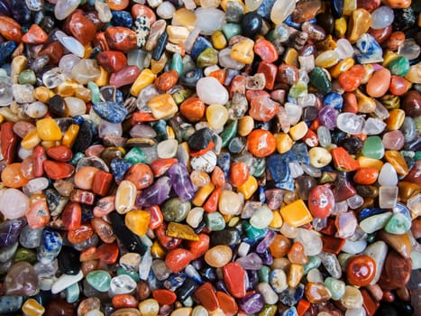 Full framed close-up view of round cut and polished mineral stones.