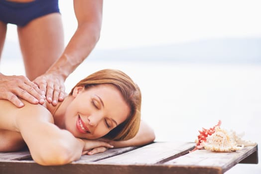 Young woman enjoying outdoor massage