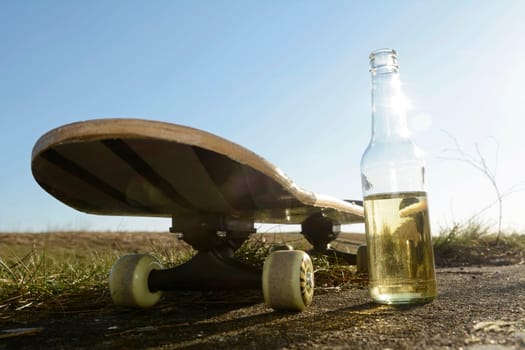skateboard and bottle