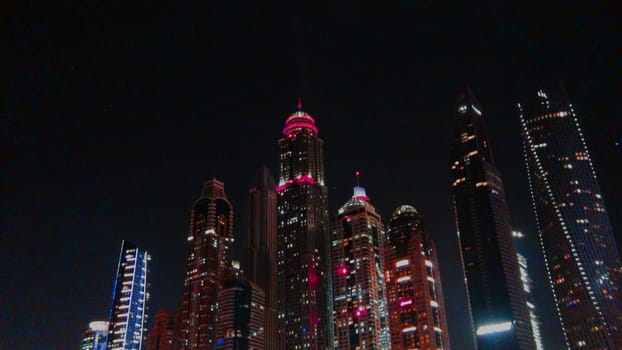 Malaysia. Fantastic night view of skyline with illuminated skyscrapers in Kuala Lumpur city.