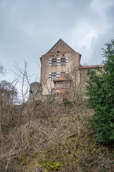 Old building with windows at Ronneburg Castle, Germany, vertical shot view from the distance