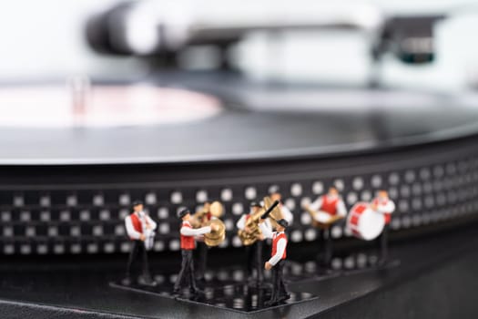 Miniature brass band and turntable background