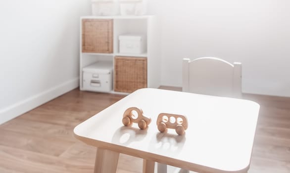 White childroom in pastel colors in scandinavian minimalist style. Empty playroom.
