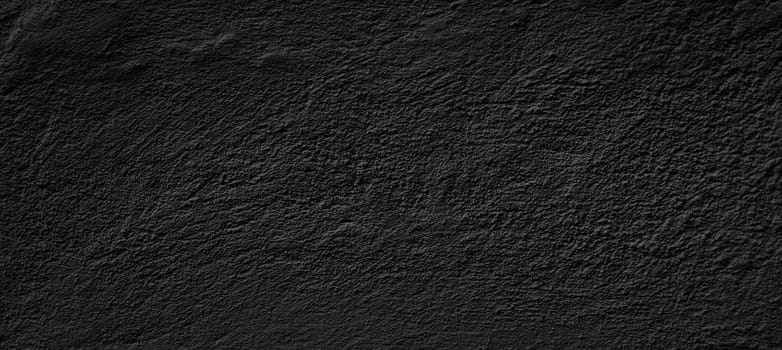 Empty concrete wall covering by plaster and painting in black colour. Concept as wallpaper and background.