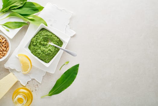 Making Fresh ramson or wild garlic pesto. Healthy spring food concept