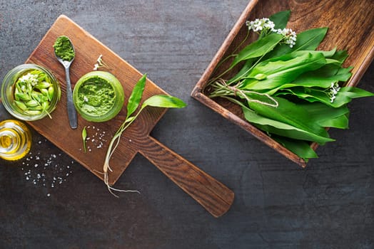 Making Fresh ramson or wild garlic pesto. Healthy spring food concept