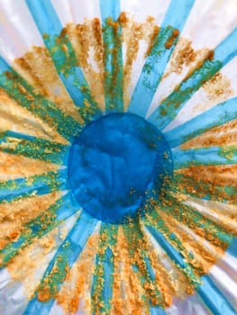 blue sun rays background, chamomile flower, abstraction