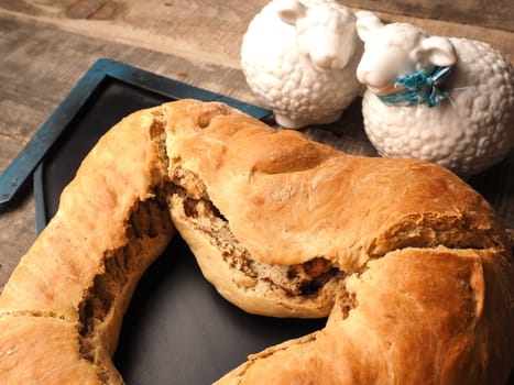 Yeast dough formed into a heart, baked until golden brown, traditional handwork, Easter bread