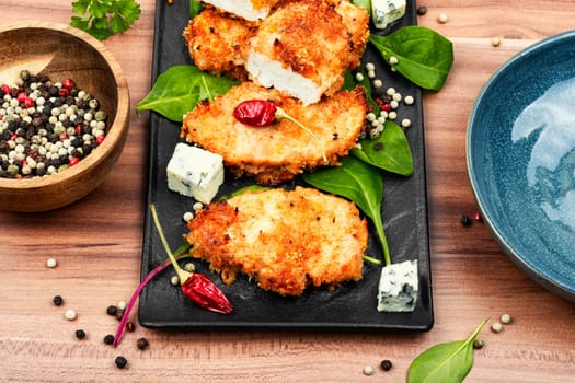 Grilled spicy chicken breasts in breadcrumbs, chicken meat. Homemade chicken nuggets