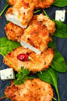 Grilled spicy chicken breasts in breadcrumbs, chicken meat. Homemade chicken nuggets
