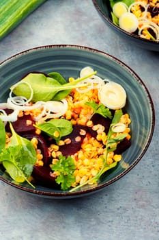 Vegetarian salad with beetroot, lentils, onions and herbs. Low calorie salad.