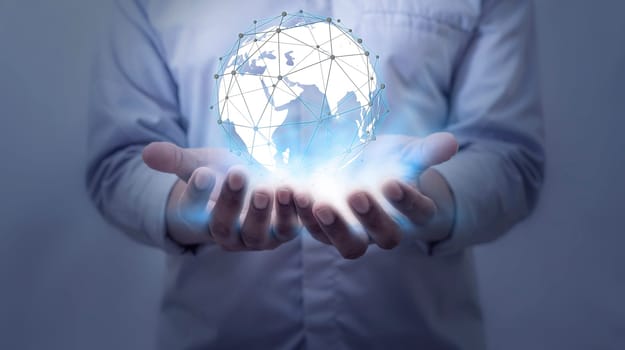 Global internet connection application and technology digital marketing, Financial and banking, Businessman holding globe on blurred background