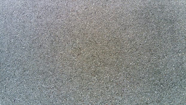 Smooth asphalt road. The texture of the tarmac, top view. Horizontal photography