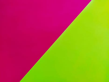 Yellow-pink bright background. Diagonally laid sheets of colored paper with a gradient and light flare.