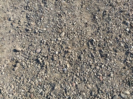 Gray stones background. Small and large gravel. Natural background.
