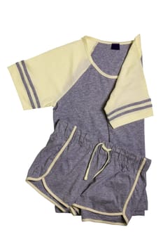 Closeup of gray yellow female sexy nightwear summer set of shorts and a top or shirt isolated on a white background. Clipping path. Fashionable night wear or nighties.