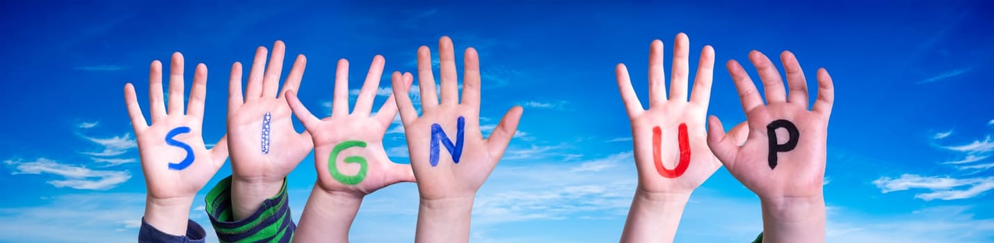 Children Hands Building Colorful English Word Sign Up. Blue Sky As Background