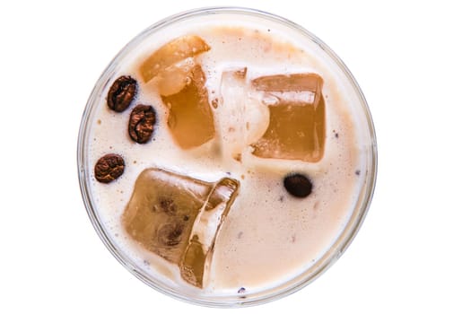 Cocktail white russian in facetted glass, top view